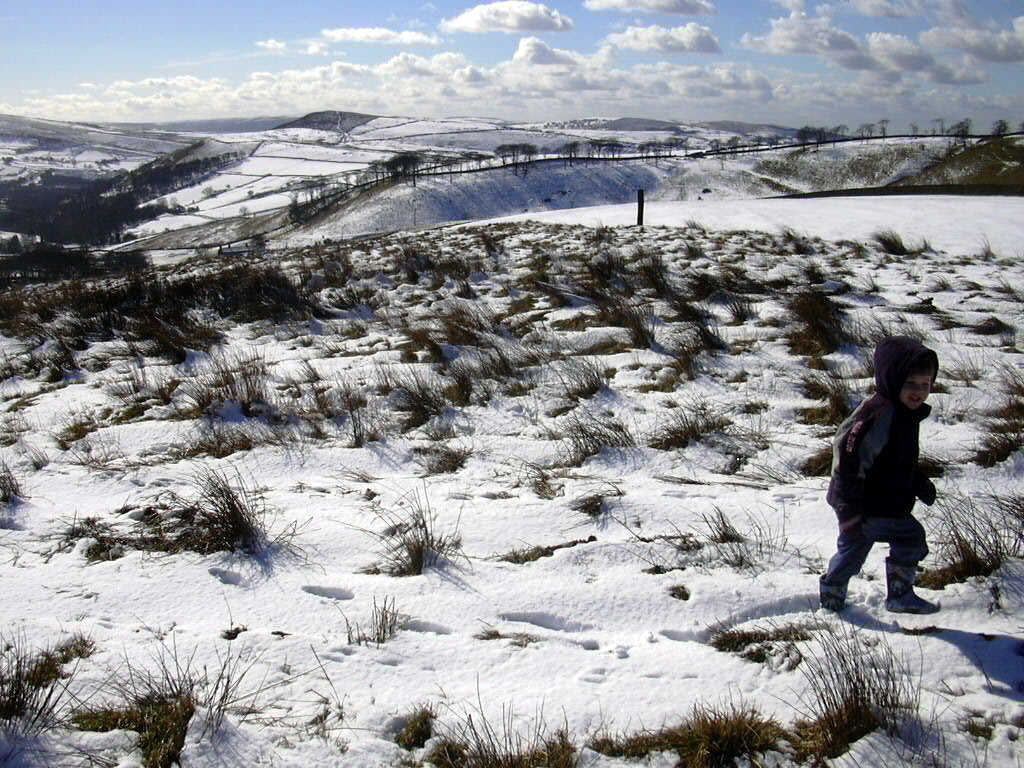 Boy makes prints in snow